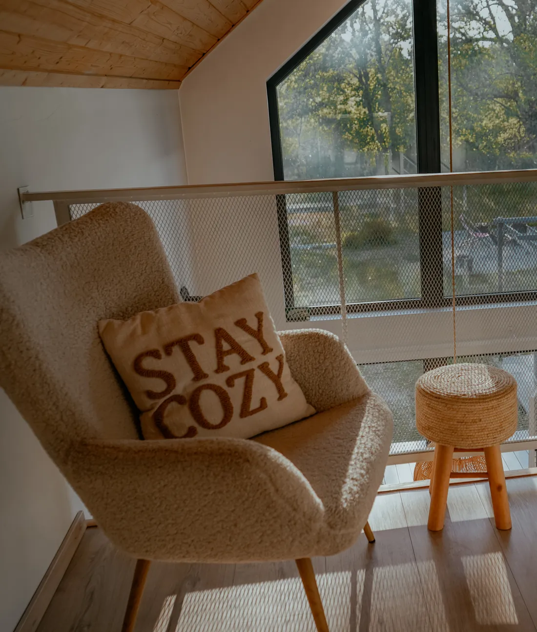 Armchair with a Stay cozy cushion on the mezzanine